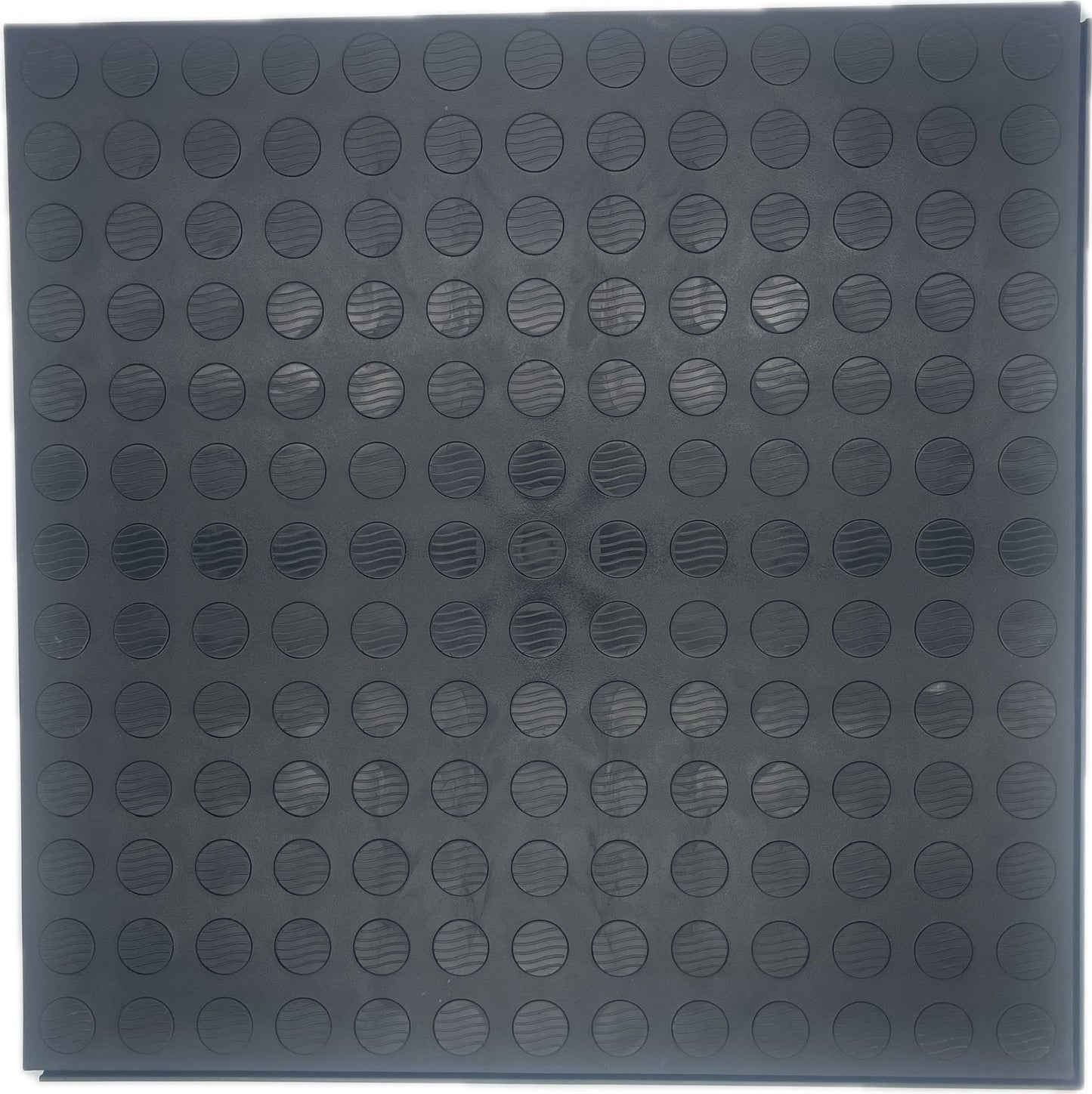 A square black solid flooring mat with a grid pattern of raised circular dots, shown flat against a white background.
