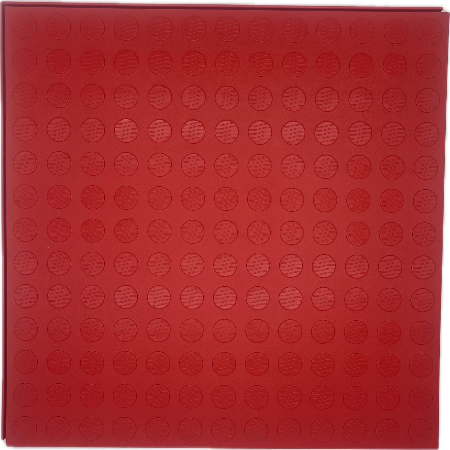 A square red garage floor mat with an embossed circular dot pattern, shown flat against a white background.
