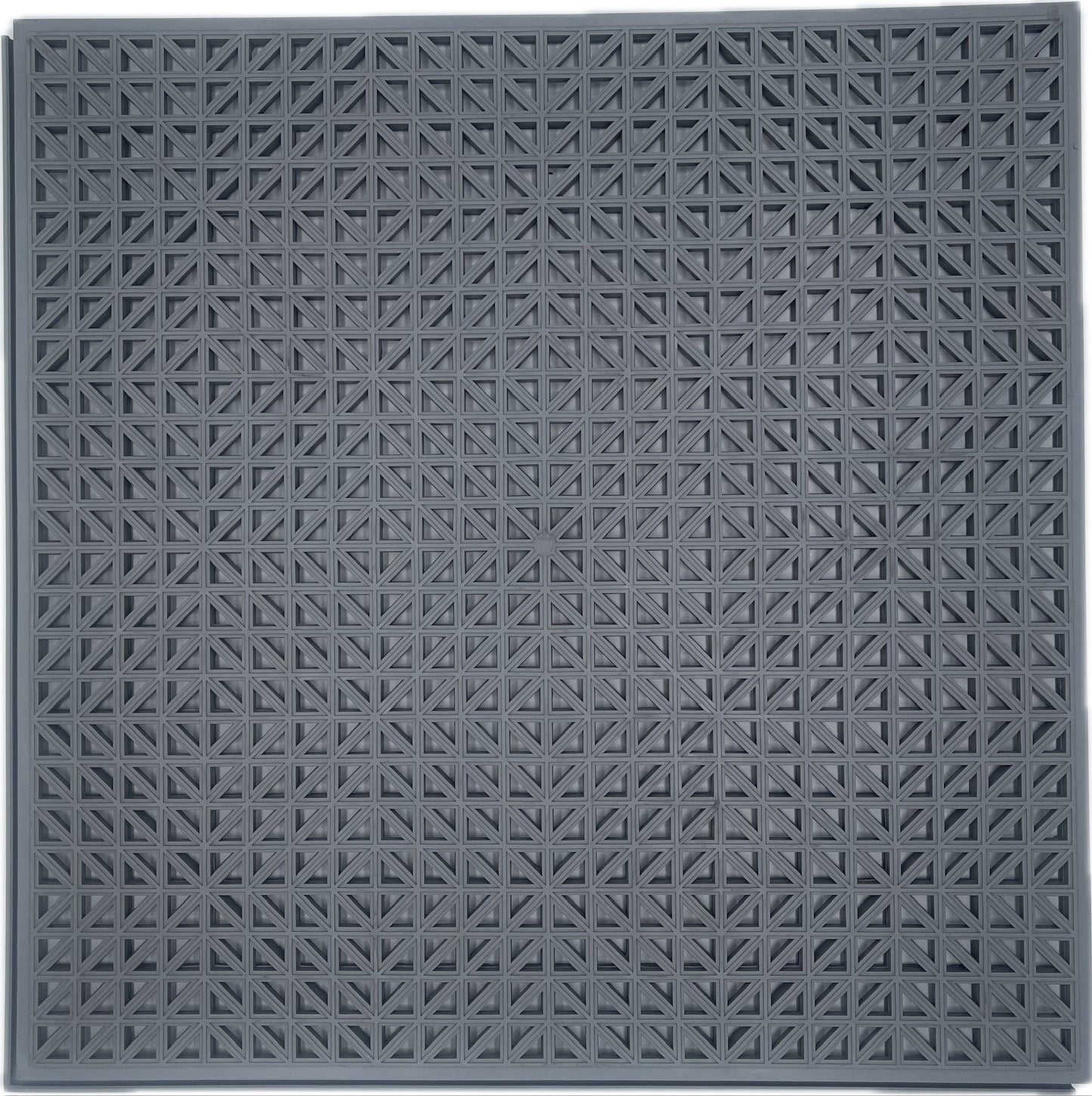 A square dark gray textured flooring mat with a repeating geometric star-like embossed pattern, shown flat against a white background.