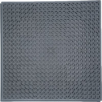A square dark gray textured flooring mat with a repeating geometric star-like embossed pattern, shown flat against a white background.
